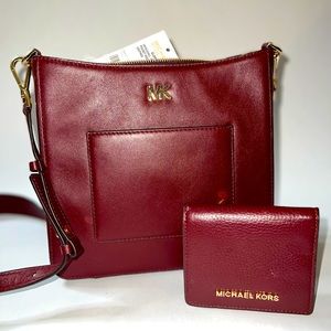 Micheal Kors leather Crossbody Purse with matching small wallet; color burgundy